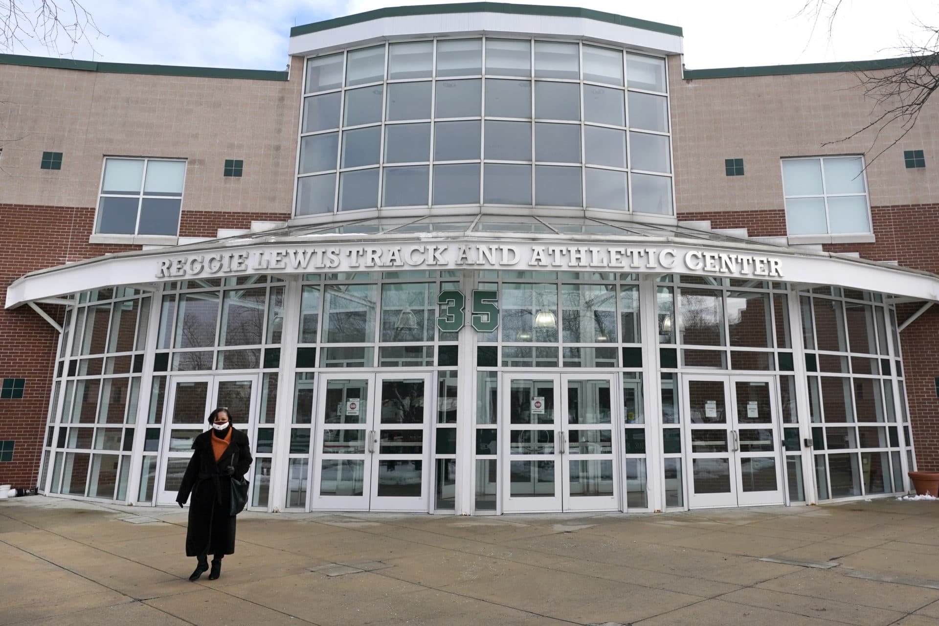 Dr. Valerie Roberson, president of Roxbury Community College, walks out of the Reggie Lewis Track and Athletic Center, on Feb. 3, 2021. (Elise Amendola/AP)