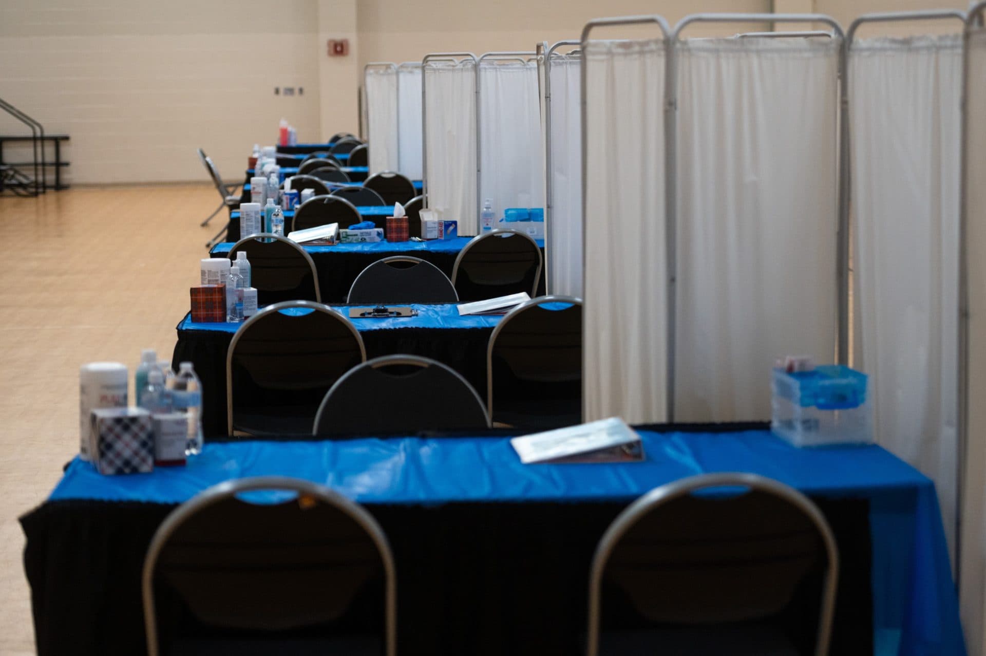 Tables set up inside the vaccination site at the Reggie Lewis Center in Roxbury. The site is a joint effort between the city of Boston and Roxbury Community College. (Courtesy Jeremiah Robinson/Mayor's Office)