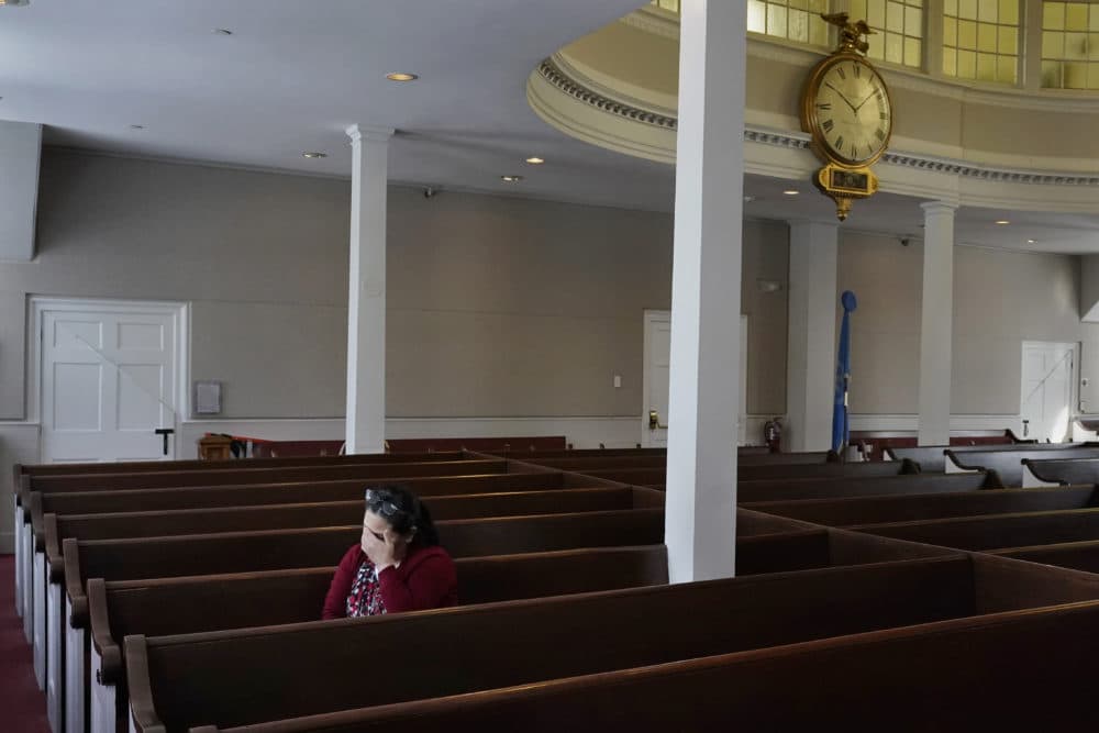 Maria Macario pauses as she talks about her family during an interview at the First Parish church on Jan. 29. (Charles Krupa/AP)