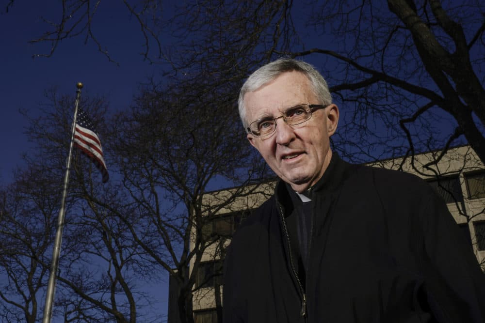 Father Jim Connell poses for a portrait outside his home in Milwaukee on Dec. 2, 2020. (Morry Gash/AP)