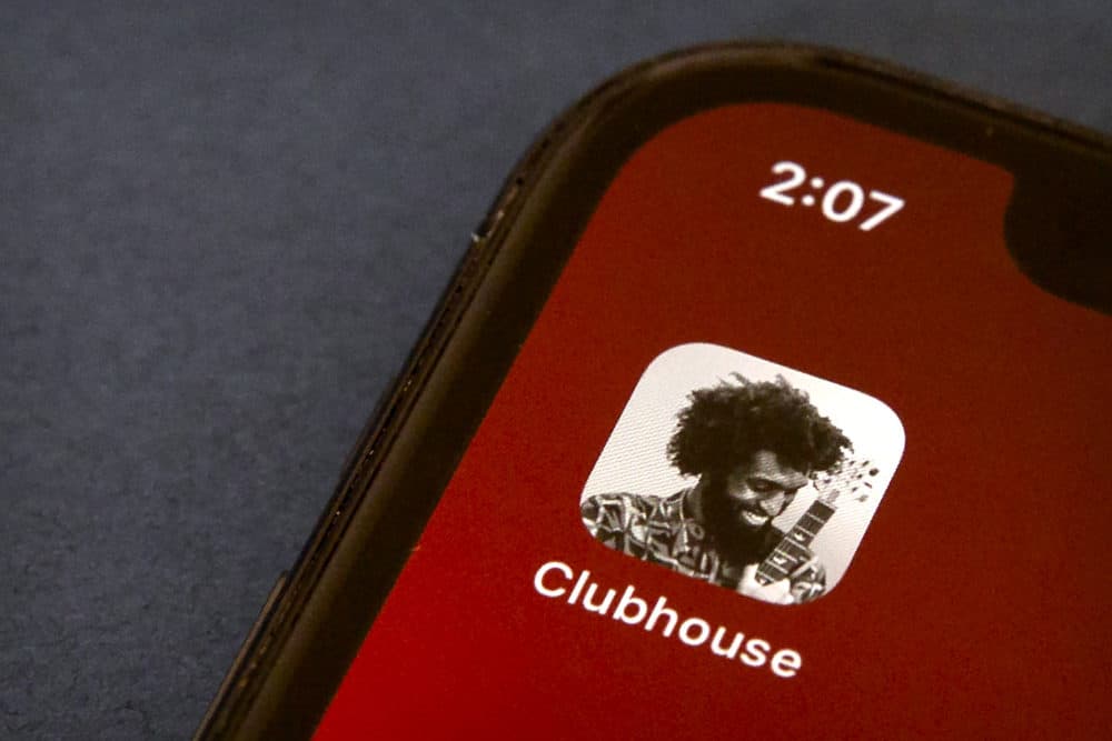 The icon for the social media app Clubhouse is seen on a smartphone screen. (Mark Schiefelbein/AP)