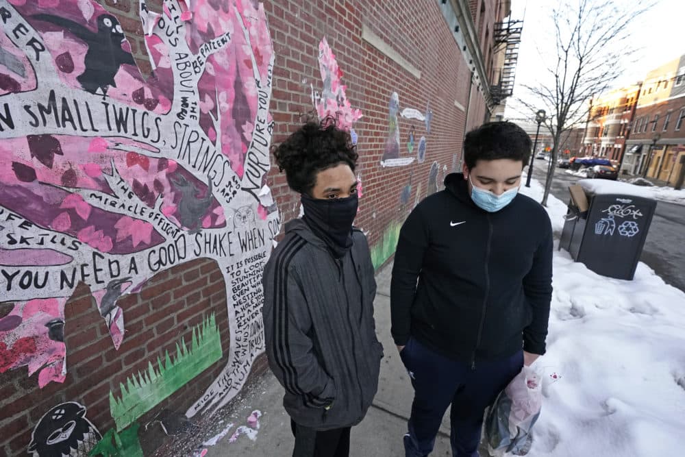 High school sophomores Jose Cruz, left, and Mannix Resto, both of Chelsea, Mass., speak about the COVID-19 pandemic and how it has impacted them. (Elise Amendola/AP)
