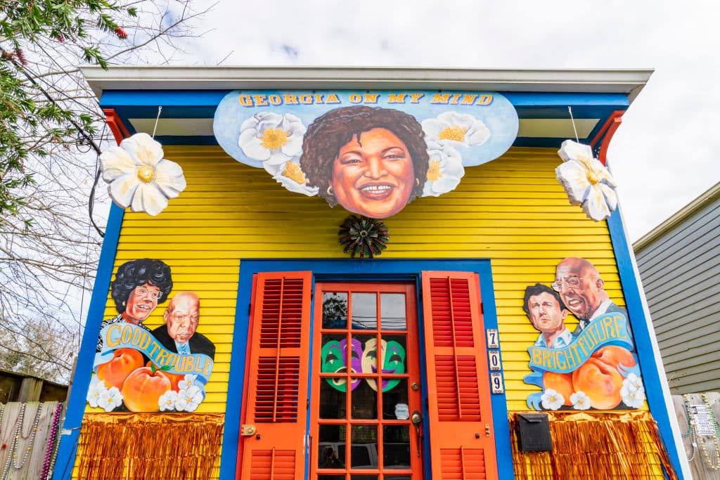 A house float features politicians Stacey Abrams, Raphael Warnock, Jon Ossoff, Shirley Chisholm and John Lewis on Jan. 30 in New Orleans. (Erika Goldring/Getty Images)