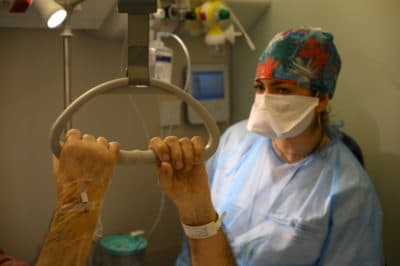 'The Hospital Is A Lonely Place': Comforting COVID Patients In Their Own Language