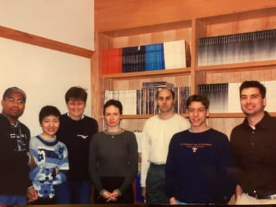 From the photo album of author David Scales (second from right), the lab team that included Katalin Kariko (third from left.)