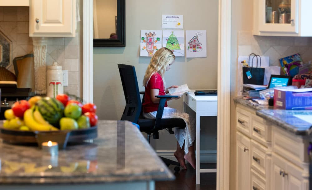 A student studies at a makeshift desk during at-home learning in Orange, CA on Wednesday, December 9, 2020. (Paul Bersebach/MediaNews Group/Orange County Register via Getty Images)