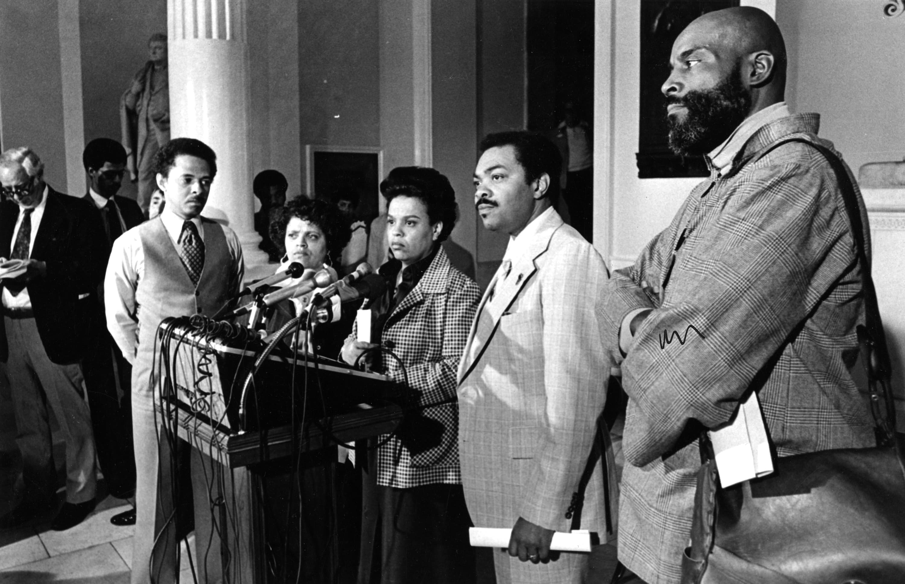 From left, Black Caucus members Representative Royal Bolling Jr., Senator Saundra Graham, Representative Doris Bunte, Senator Bill Owens and Representative Mel King appear during a press conference in 1979. (George Rizer/The Boston Globe via Getty Images)