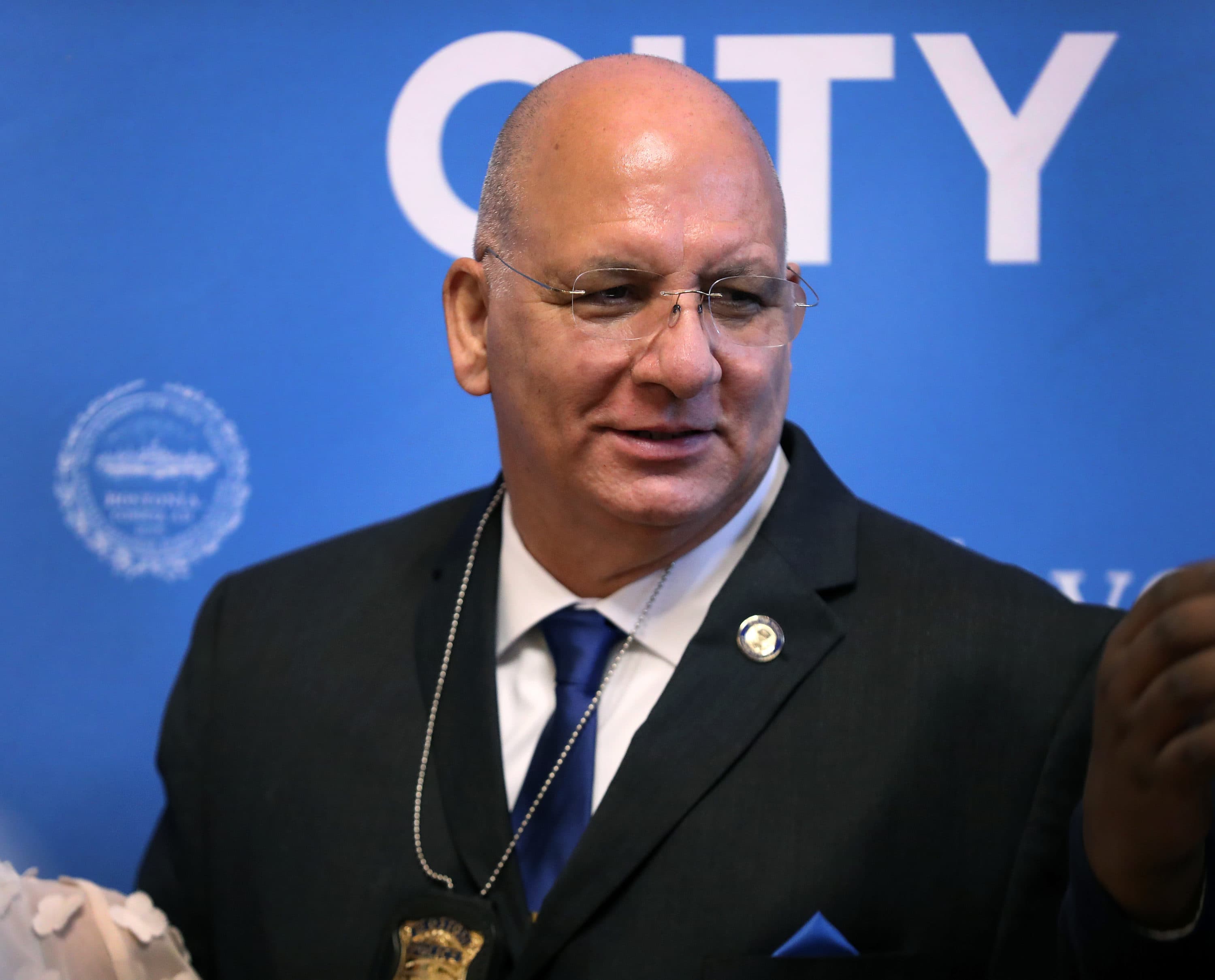 Dennis White after he was sworn in as commissioner in February.