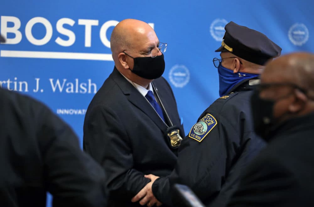 Dennis White, left, was sworn in by Mayor Marty Walsh (not pictured) as the 43rd commissioner of the Boston Police Department during a ceremony in the Great Hall at Faneuil Hall on Feb. 1. (Jim Davis/Boston Globe)