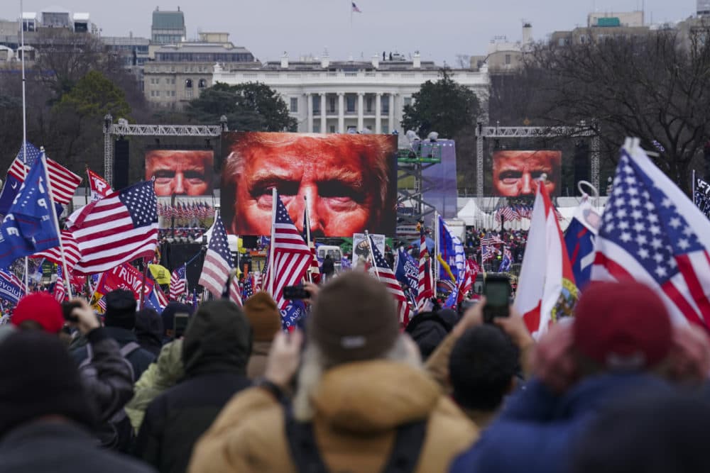 Trump supporters participate in the Jan. 6 rally that turned into a violent attack at the U.S. Capitol. (John Minchillo/AP)