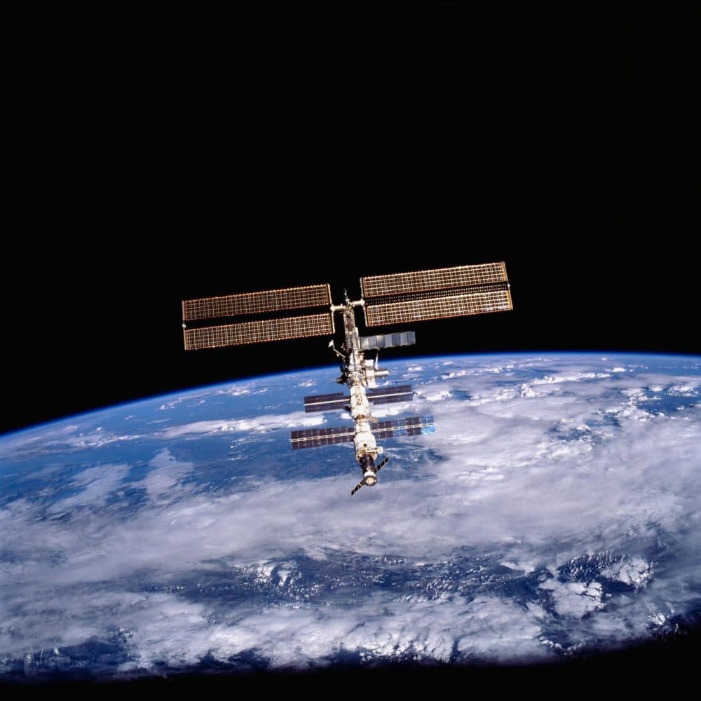 This image of the International Space Station (ISS) was photographed by one of the crew members of the STS-105 mission from the Shuttle Orbiter Discovery after separating from the ISS. (NASA)