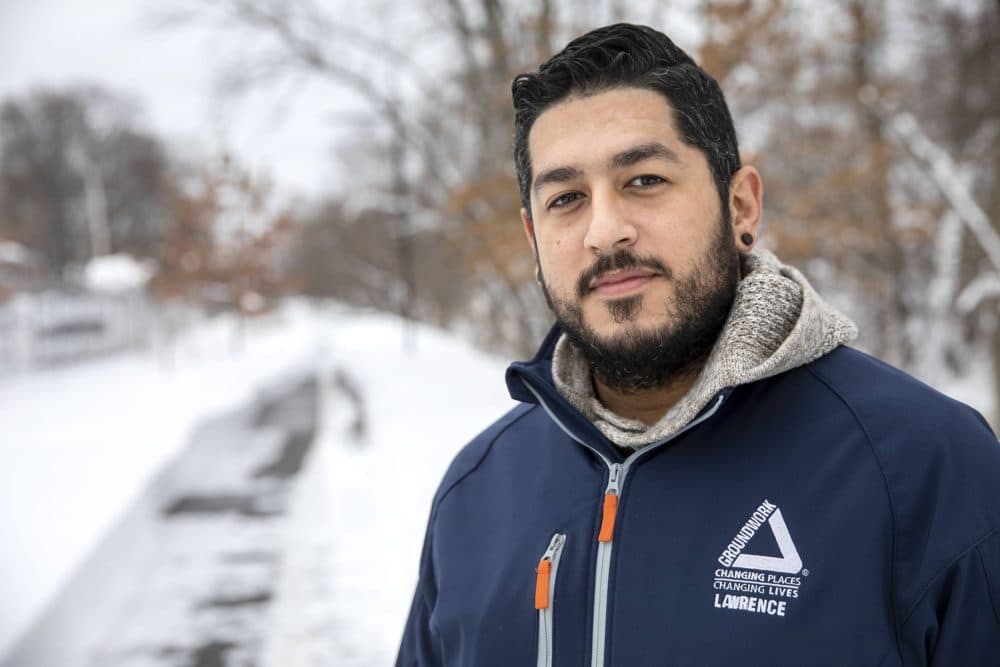 Eddie Rosa of Groundwork Lawrence on the Spicket River Greenway. (Robin Lubbock/WBUR)