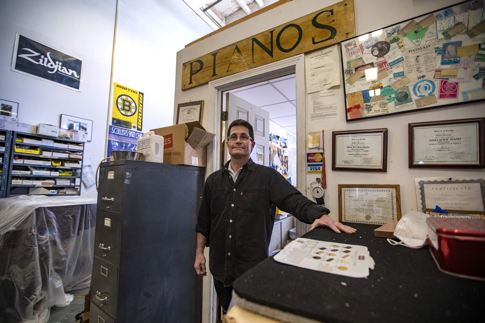 Fred Mudge at his workshop in Hyde Park. (Jesse Costa/WBUR)