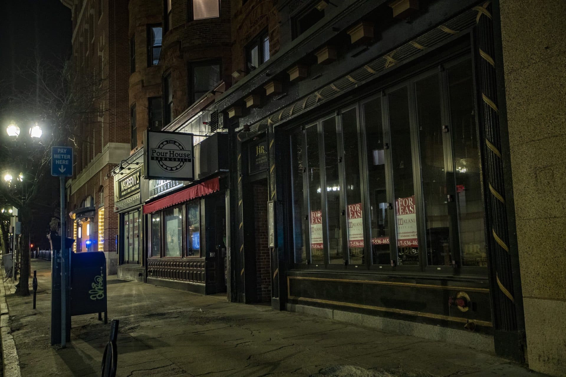 McGreevey’s, Pour House, and Lir, in a usually-bustling block on Boylston Street, is dead at midnight in March 2021. (Jesse Costa/WBUR)