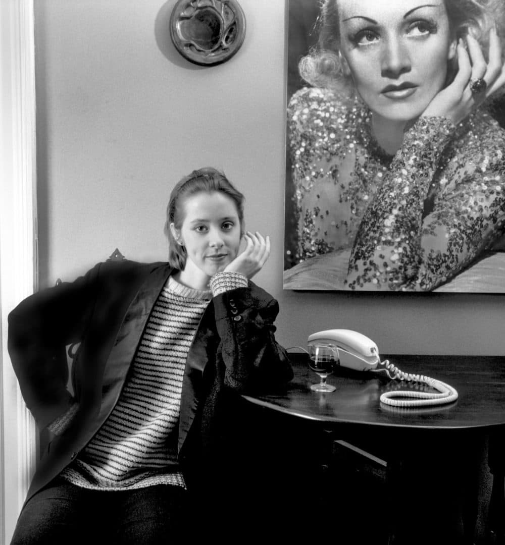 Suzanne Vega in front of a portrait of Marlene Dietrich, photographed by Susan Wilson. (Courtesy)