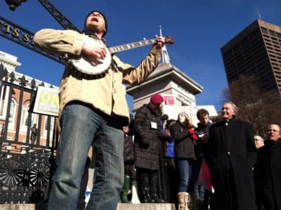 The author singing "This Land is Your Land" with Ed Markey at the One Million Moms for Gun Control rally, Boston State House, January 1, 2013. (Courtesy)