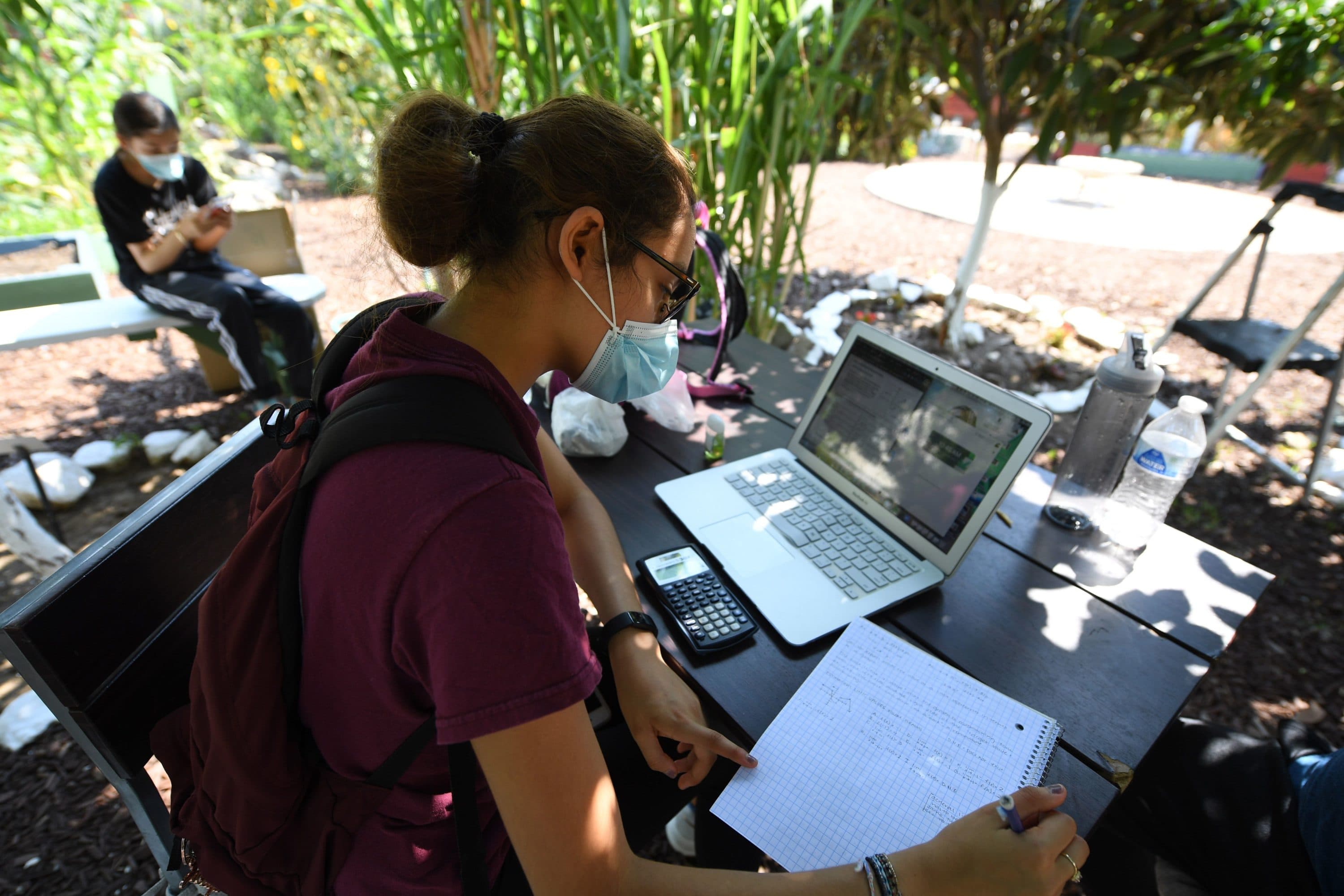 A high school senior completing classes remotely. (Robyn Beck/AFP via Getty Images)