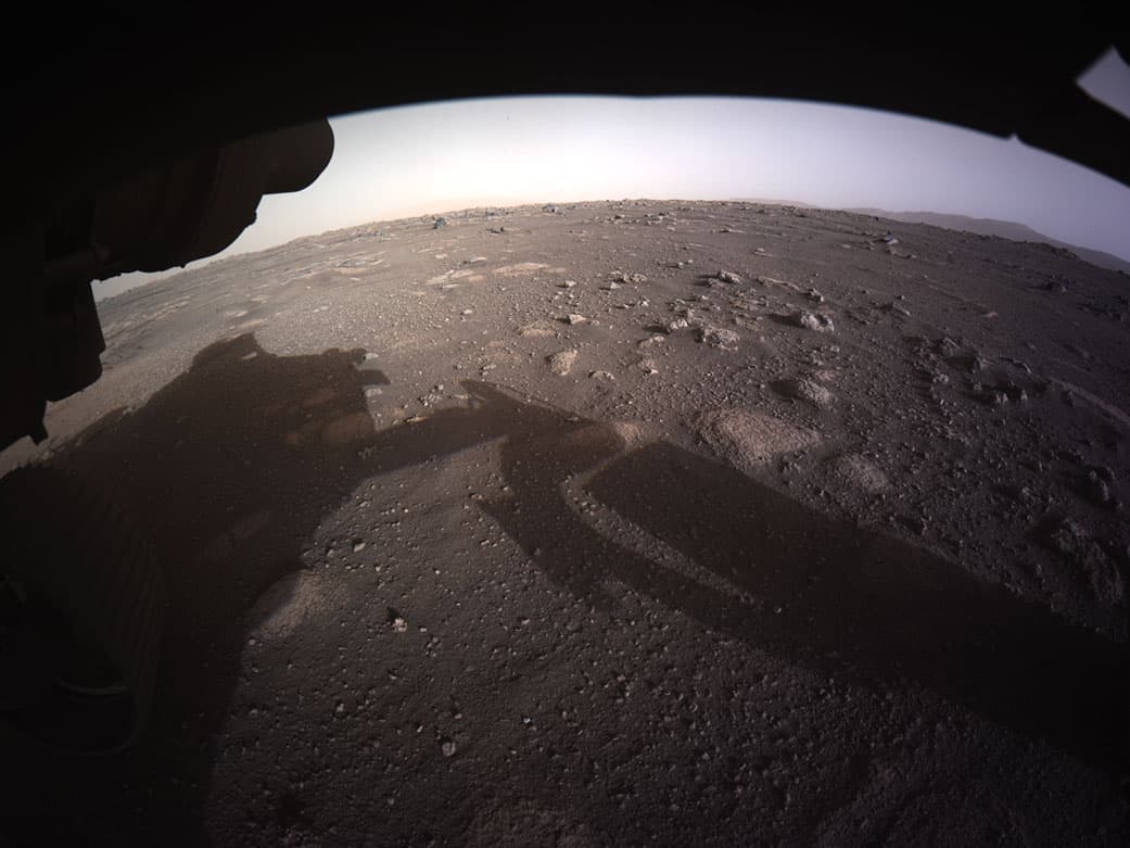 The first high-resolution, color image to be sent back by the Hazard Cameras (Hazcams) on the underside of NASA’s Perseverance Mars rover after its landing in the area known as Jezero Crater on Feb. 18, 2021 on the planet Mars. (Photo by NASA via Getty Images)