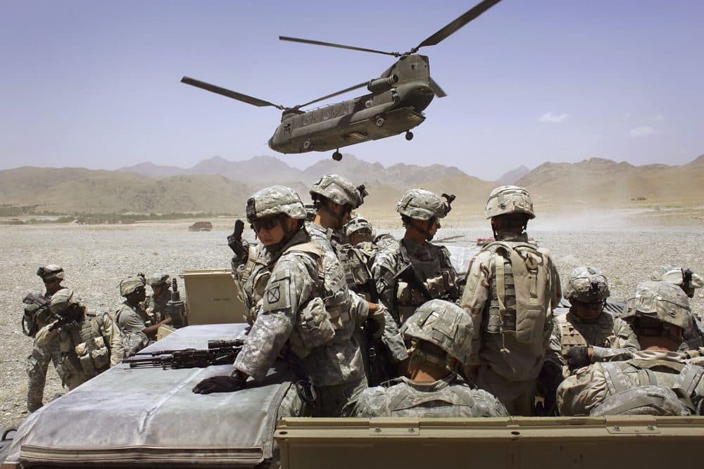 American soldiers from the 10th Mountain Division deploy to fight Taliban fighters as part of Operation Mountain Thrust to a U.S. base near the village of Deh Afghan on June 22, 2006 in the Zabul province of Afghanistan. (Photo by John Moore/Getty Images)
