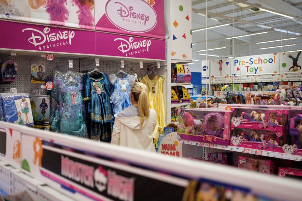A woman browses the costume selection in Toys &quot;R&quot; Us in 2017. (Leon Neal/Getty Images)