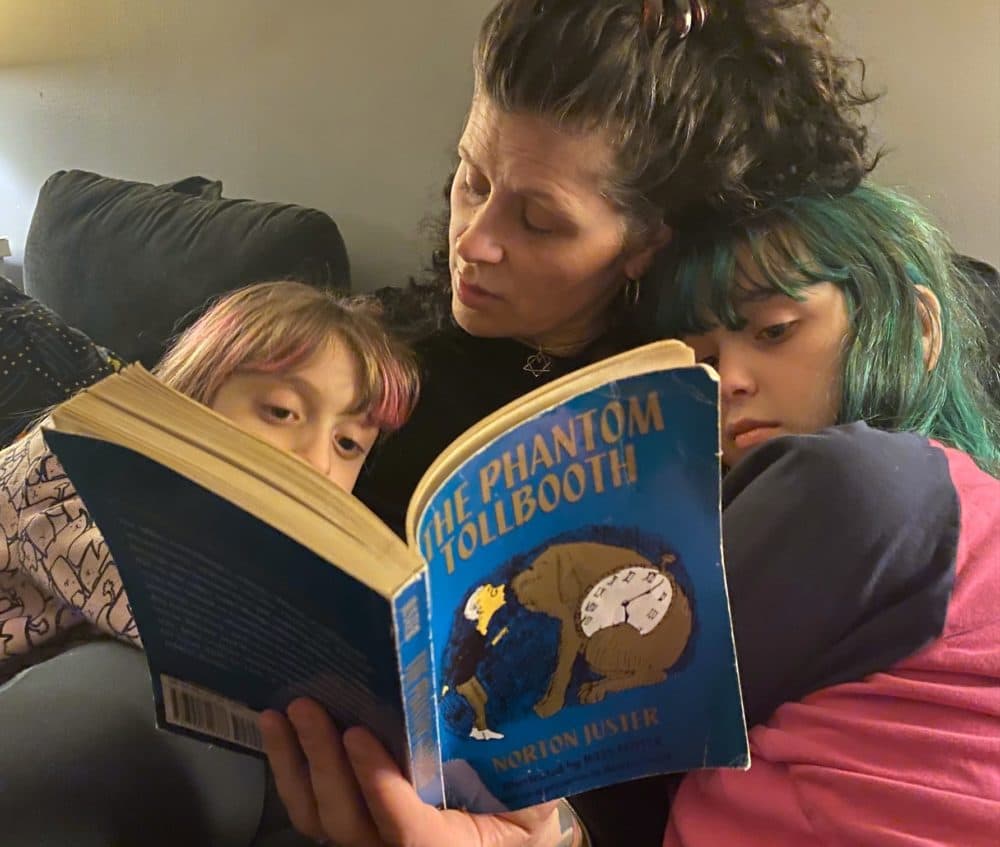 The author reading her daughters, &quot;The Phantom Tollbooth,&quot; in March 2021. (Courtesy)