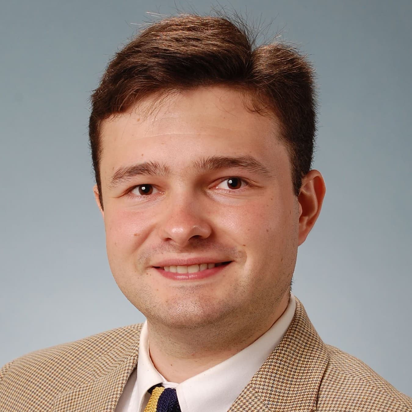 Headshot of Michael P.H. Stanley