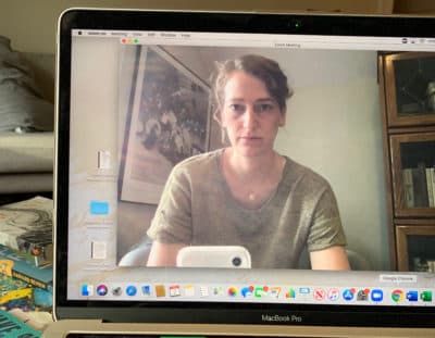 The author preparing for a Zoom meeting. She took a selfie when she saw the shadows under her eyes, a result of lingering Covid symptoms. (Courtesy)