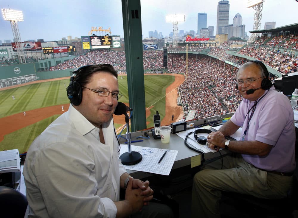 In this 2008 photo, Red Sox radio broadcasters Dave O'Brien, left, and Joe Castiglione, right, sit in their broadcast booth above Fenway Park. (Barry Chin/The Boston Globe via Getty Images)