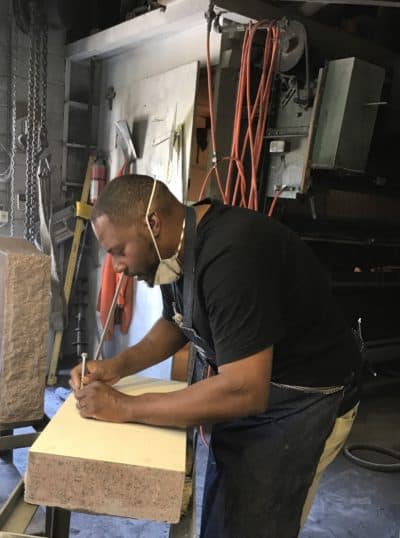 Marshall Terry working on gravestones. He owned a small gravestone and memorial business. His wife and kids are continuing his legacy. (Courtesy of Joelle Wright Terry)