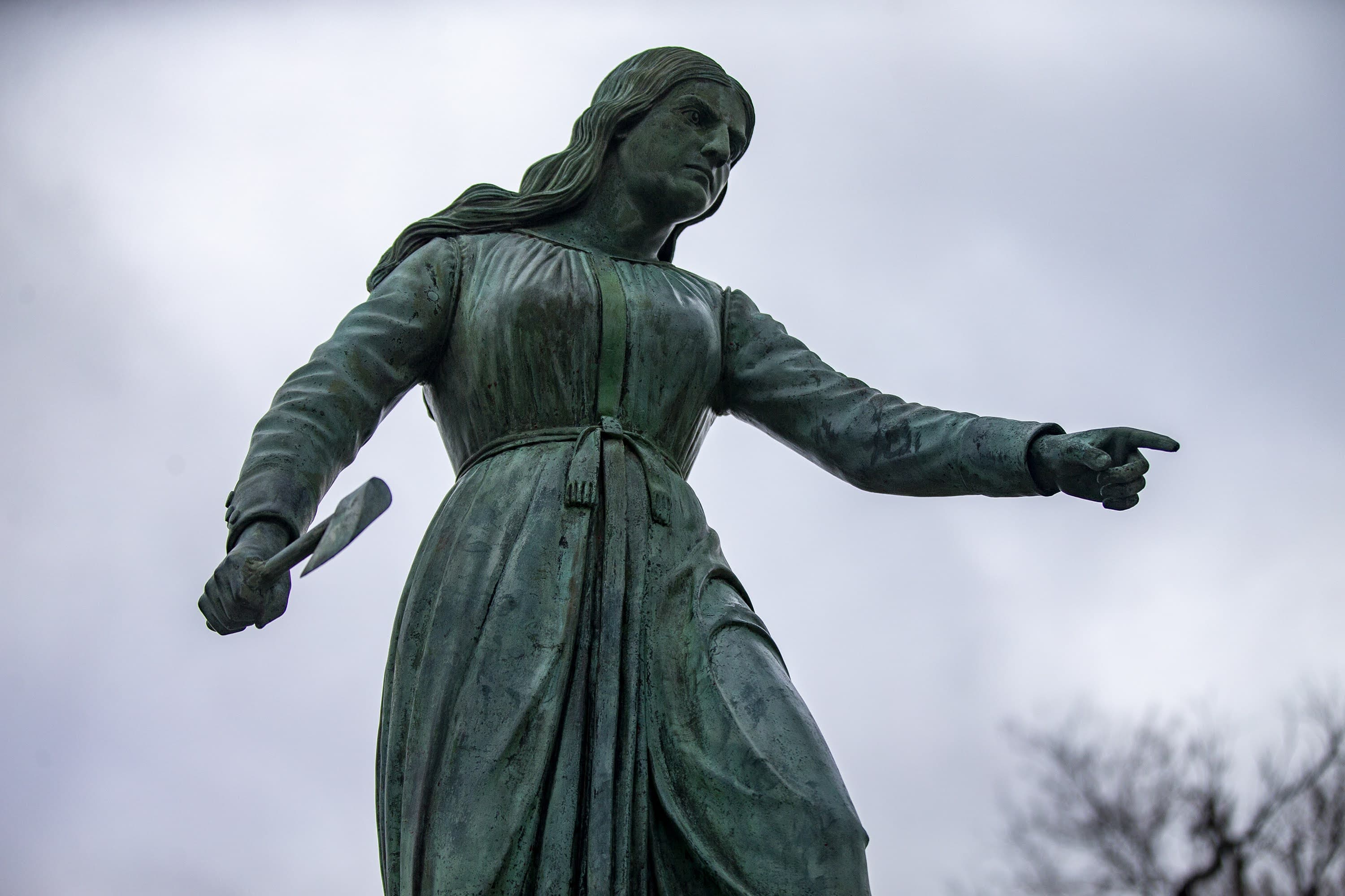 The Hannah Duston statue in G.A.R. Park in Haverhill. (Jesse Costa/WBUR)