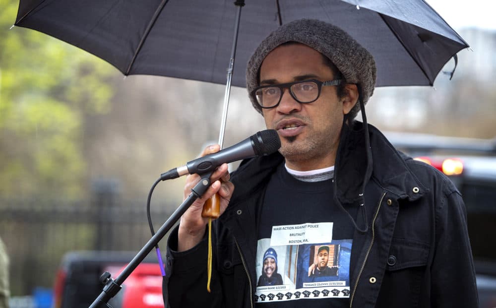 Brock Satter, a co-founder of Mass Action Against Police Brutality, at the rally at Massachusetts State House. (Robin Lubbock/WBUR)