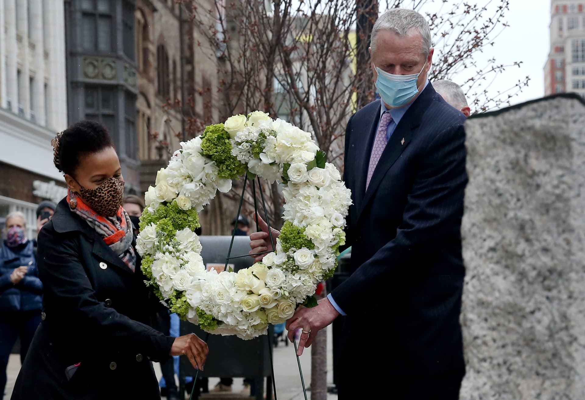 Gov. Charlie Baker and acting Mayor Kim Janey place a wreath at the site of the Boston Marathon Bombing Memorial on One Boston Day, on the eighth anniversary of the Boston Marathon bombings, on April 15, 2021 in Boston, MA. (Nancy Lane/MediaNews Group/Boston Herald)