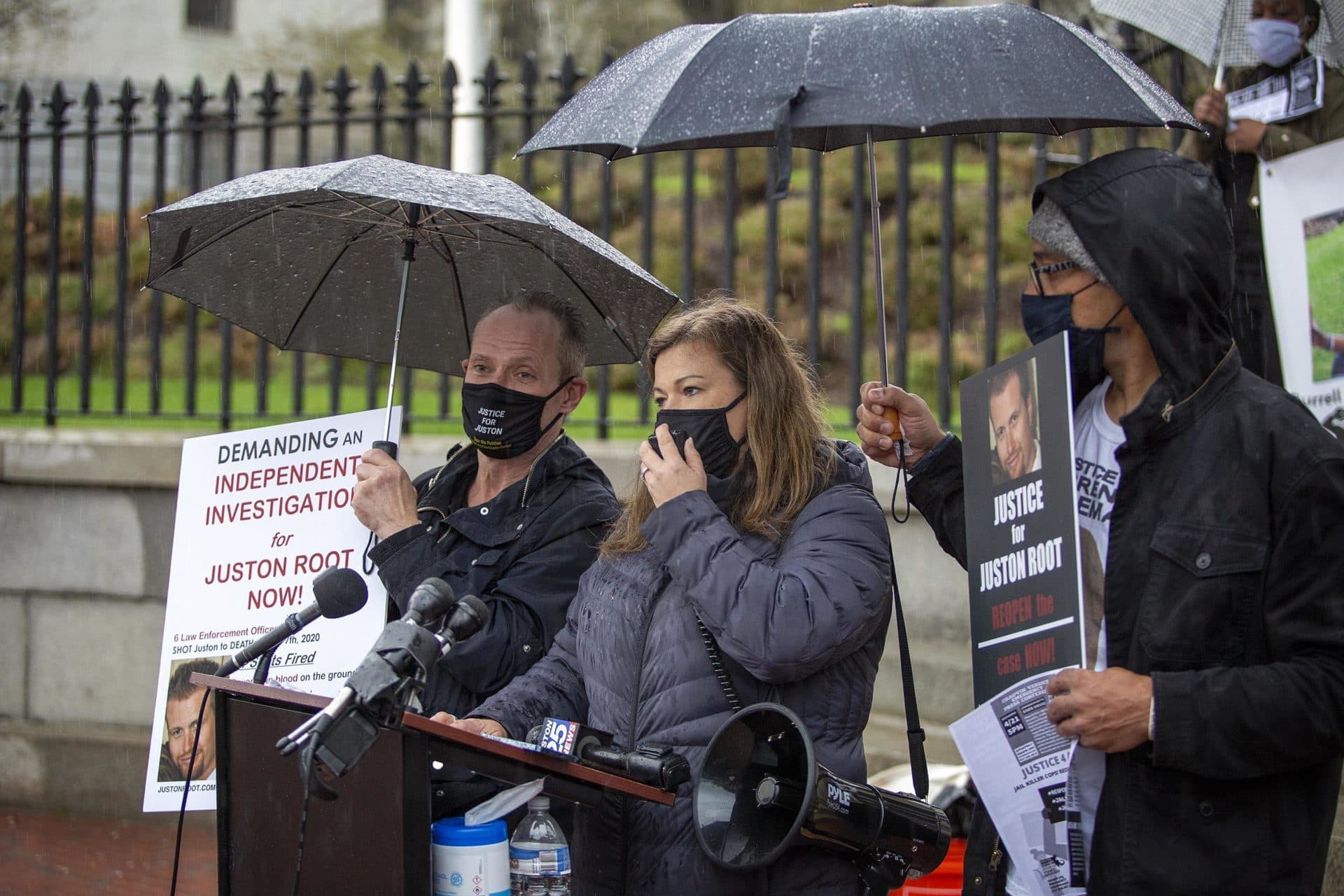 Jennifer Root talks to the crowd gathered outside the Massachusetts State House. Jennifer's brother Juston was killed by police in 2020. (Robin Lubbock/WBUR)