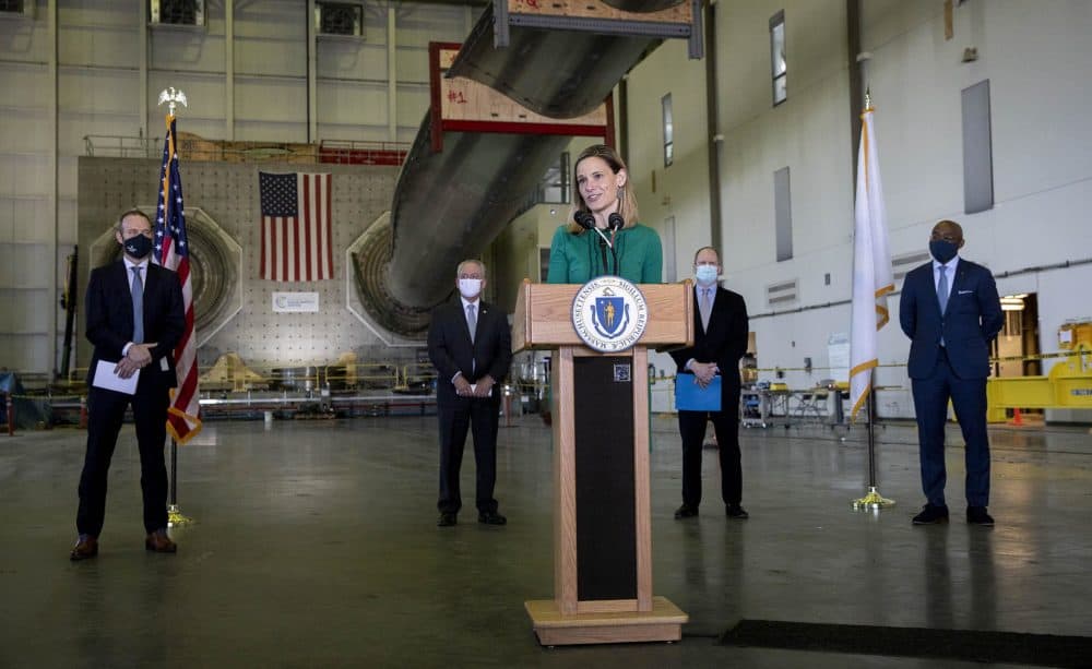 Kathleen Theoharides, Secretary of the Massachusetts Department of Energy and Environmental Affairs, talks at a press conference at the Wind Technology Testing Center in Charlestown. (Robin Lubbock/WBUR)
