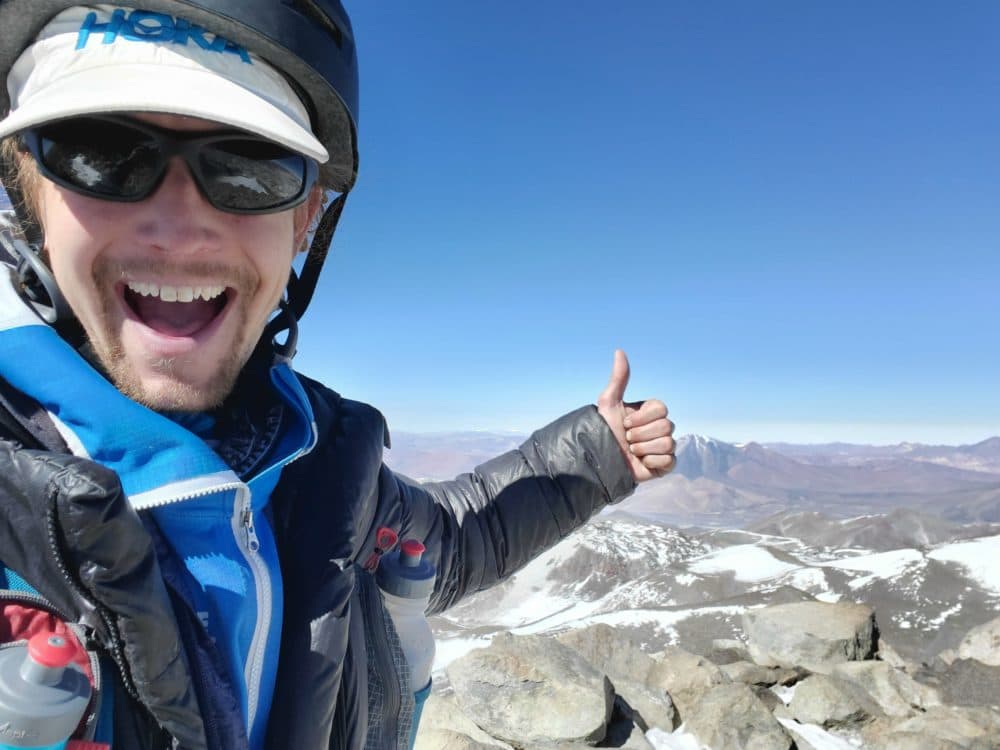 Runner Tyler Andrews gives a thumbs up as he takes on his biggest challenge yet in South America. (Courtesy of Tyler Andrews)