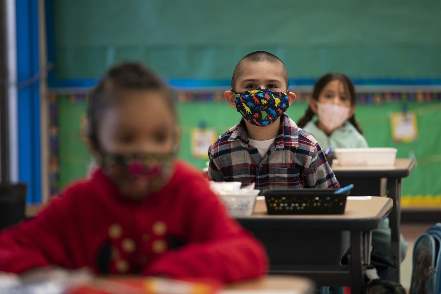 Kindergarten students sit in their classroom on the first day of in-person learning at Maurice Sendak Elementary School in Los Angeles, Tuesday, April 13, 2021. (AP Photo/Jae C. Hong)