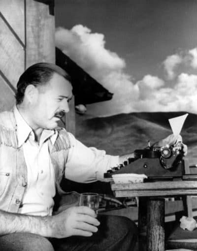 In this 1939 file photo, American novelist and short-story writer Ernest Hemingway is shown at his typewriter as he works at Sun Valley lodge, Idaho. (AP Photo/File)