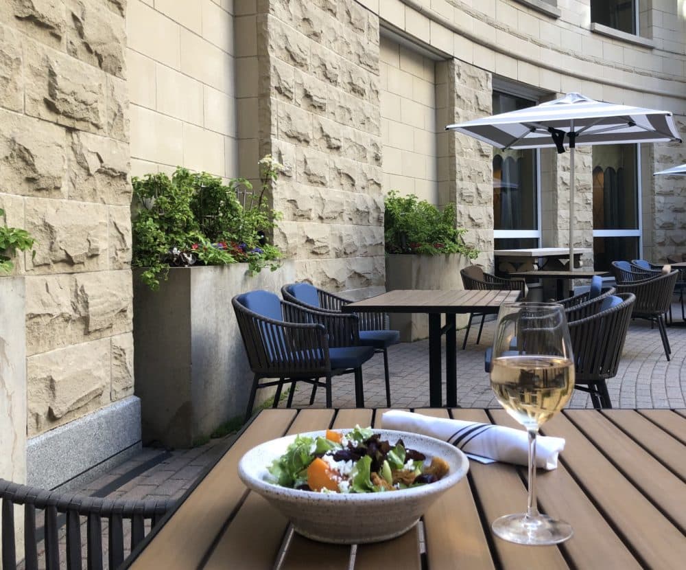 A view of a meal on Bambara's patio at the Kimpton Marlowe Hotel. (Courtesy)