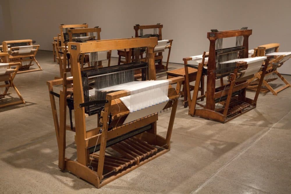 Wooden looms sit in the middle of Sonya Clark's exhibit &quot;Monumental Cloth, The Flag We Should Know&quot; at deCordova Sculpture Park and Museum. (Courtesy Carlos Avendaño)