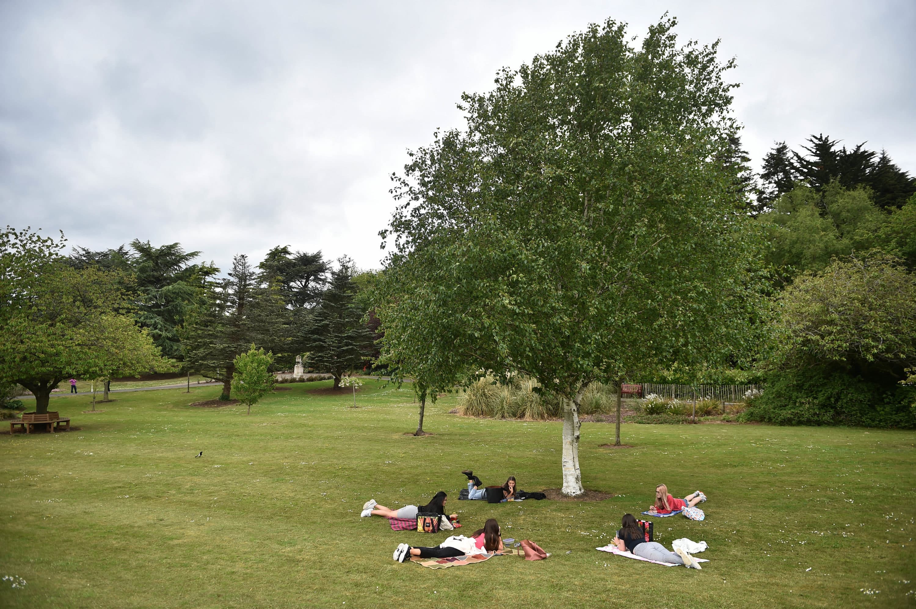 A socially distant group of friends. (Charles McQuillan/Getty Images)