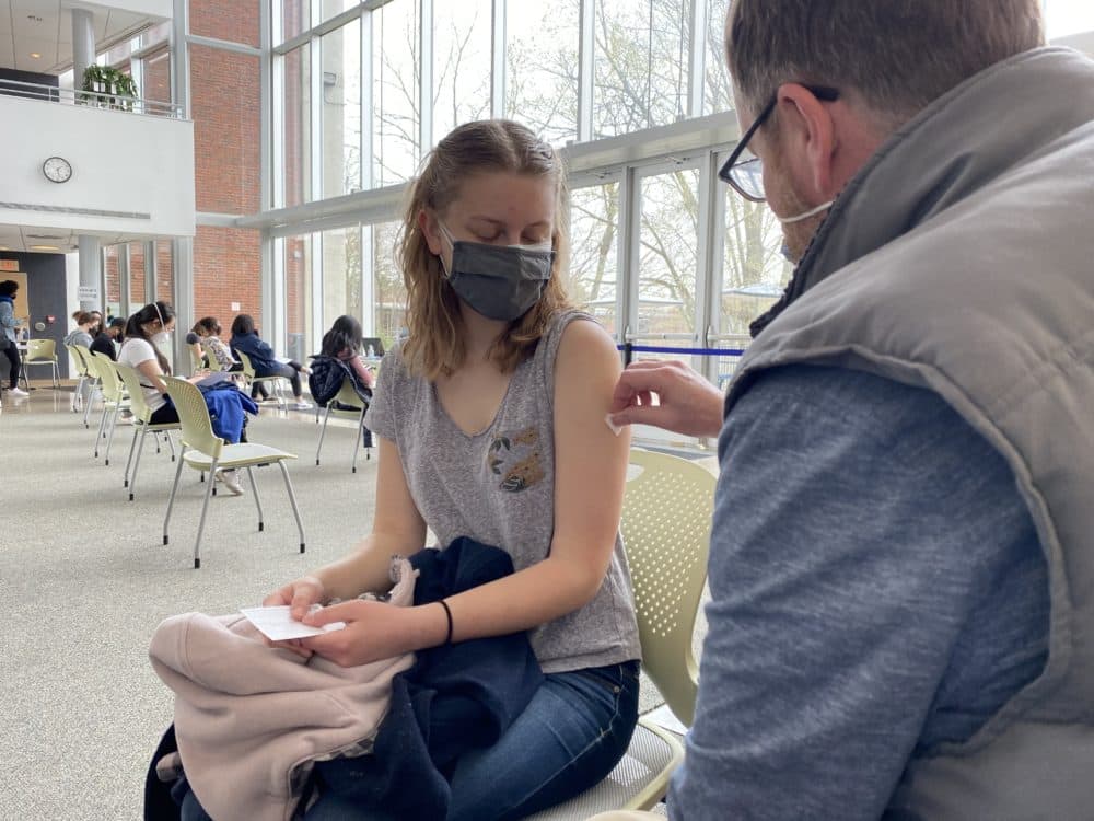 Brandeis University student Siena DeBenedittis gets vaccinated on campus. (Courtesy Brandeis University)