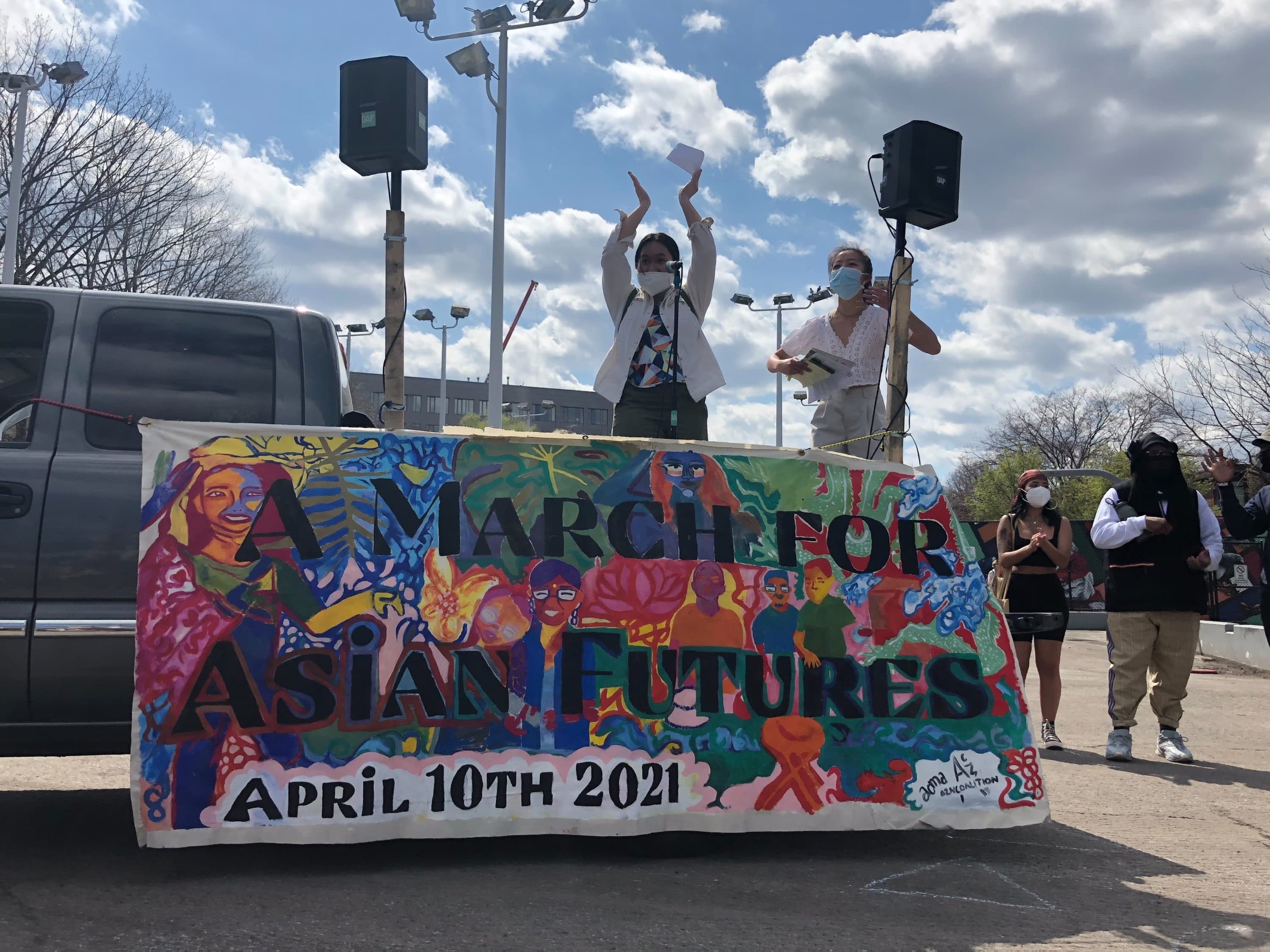 Organizers for the “Out of the Orient: A March For Asian Futures” event in Boston spoke to demonstrators and rallied against anti-Asian hate and violence (Quincy Walters / WBUR)