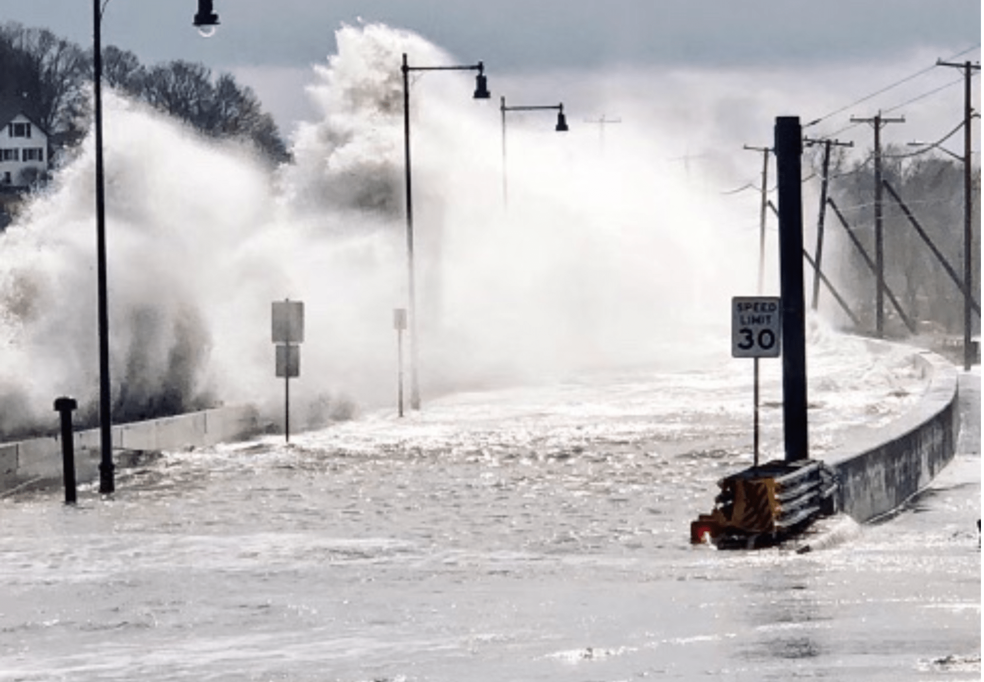 Waves crash over the Winthrop Parkway seawall during a storm in March 2018. (Courtesy of Sandra Castellarin)