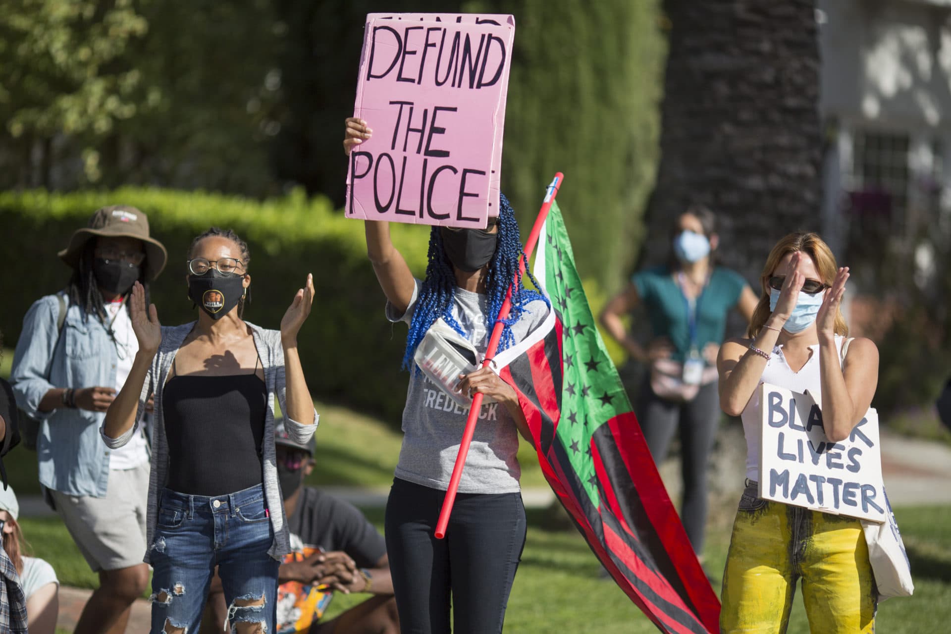 People protest outside Los Angeles Mayor Garcetti's house after the guilty verdict was announced. (Ringo H.W. Chiu/AP)