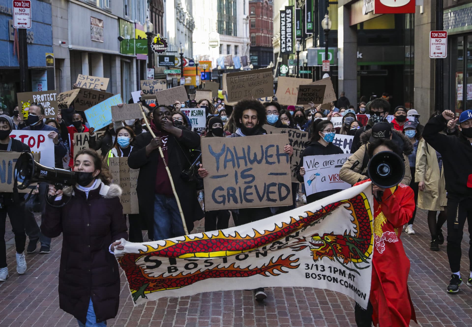 Hundreds marched through Chinatown en route to the State House during a &quot;Stop Asian Hate&quot; rally in Boston on March 13. (Erin Clark/The Boston Globe via Getty Images)