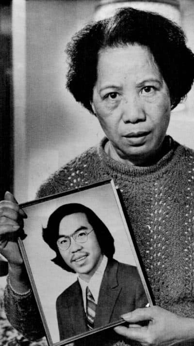 Lily Chin holds a photograph of her son Vincent, 27, who was beaten to death on June 23, 1982, in a photo made Nov. 2, 1983. (Richard Sheinwald/AP)