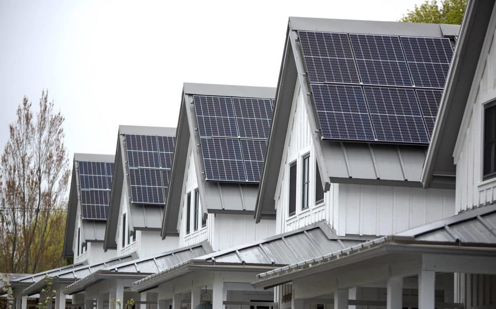 Solar panels on the rooftops of passive house buildings at the Hillside Center. (Robin Lubbock/WBUR)