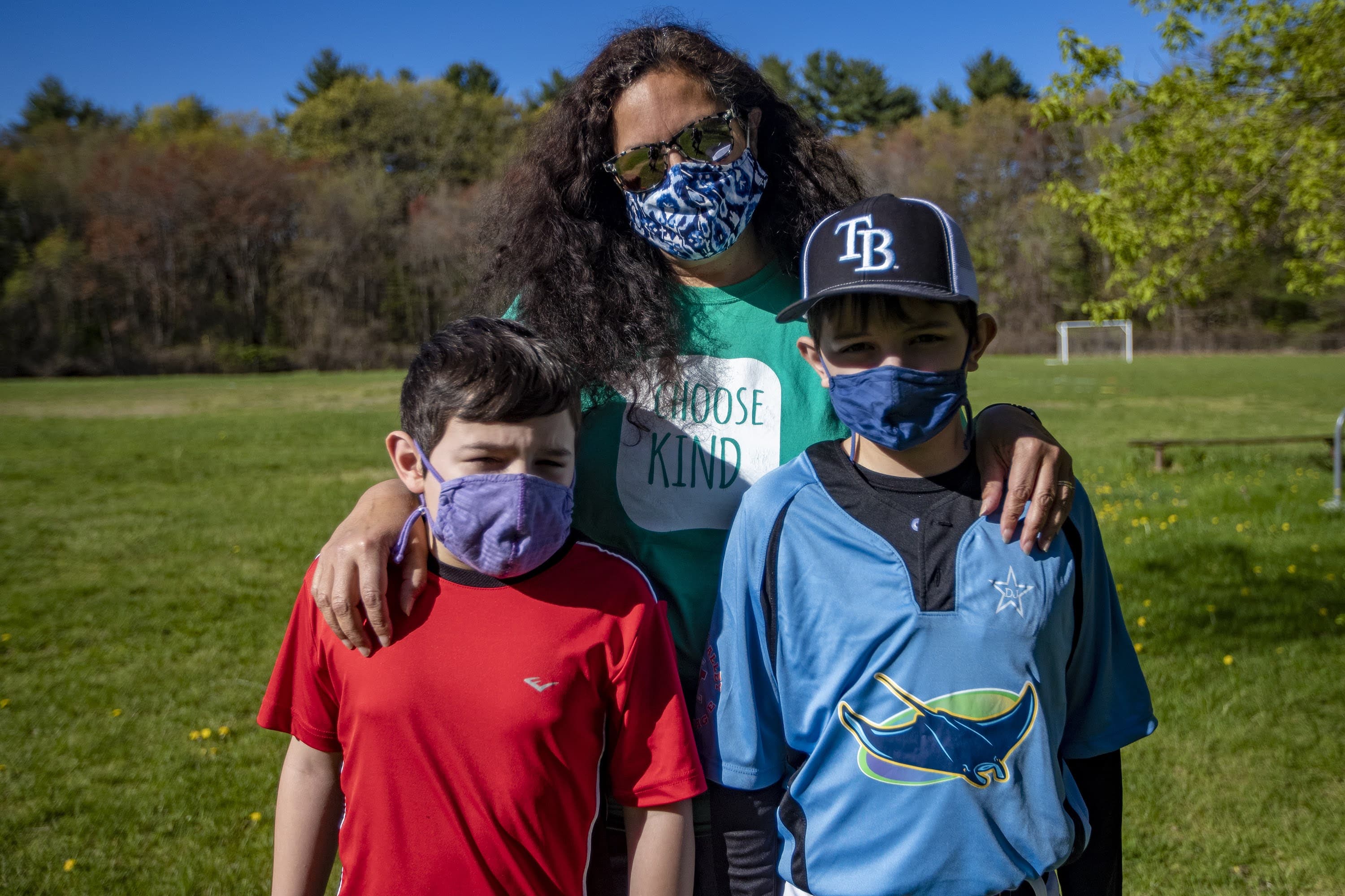 Alex Waldron, center, with her two sons Benjamin, 9, and Thomas, 11, in Maynard. (Jesse Costa/WBUR)