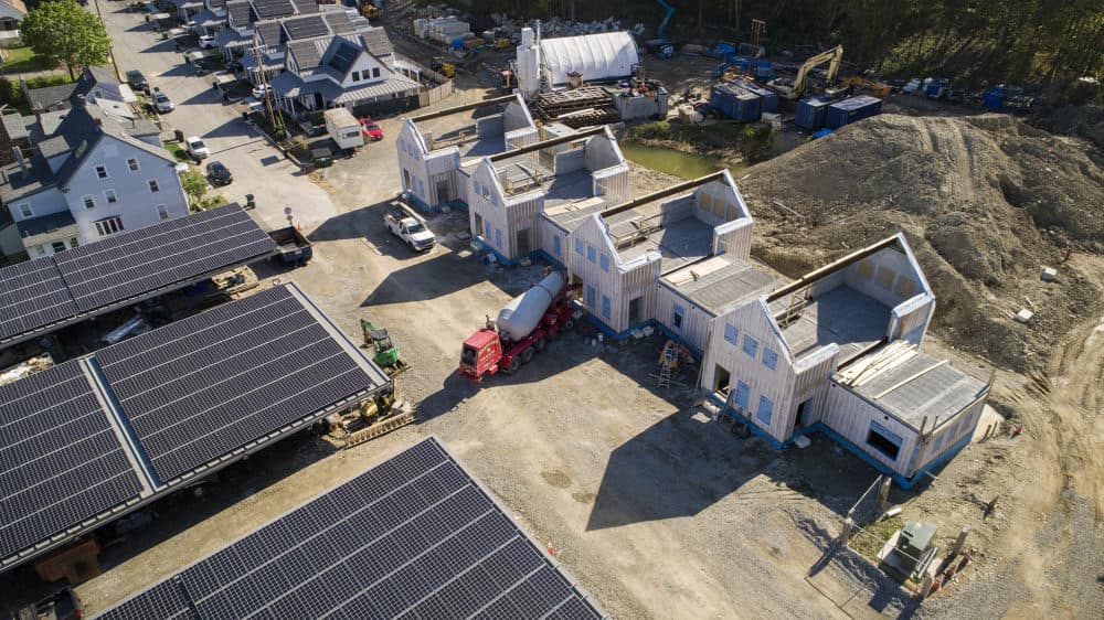 Passive house buildings under construction at the Hillside Center for Sustainable Living in Newburyport, Mass. (Robin Lubbock/WBUR)