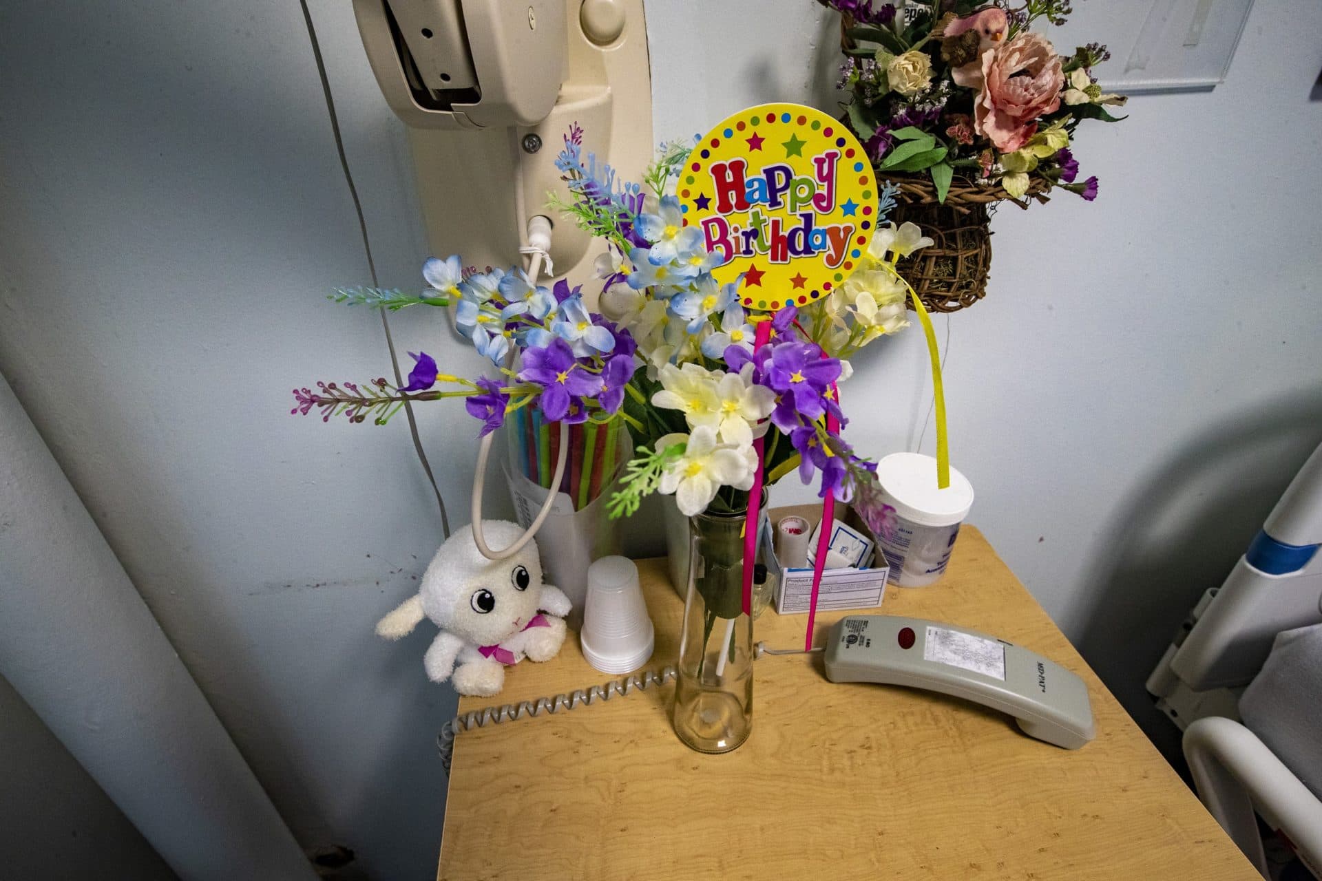 Nora Ketter received flowers for her 75th birthday in April, which was three years after she entered the hospital in Clinton. (Jesse Costa/WBUR)